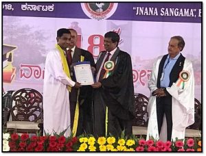 Prof. R. A. Patil receiving Ph. D degree in Chemical Engineering through hands of Hon. Dr. Karisiddappa, Vice Chancellor VTU Belagavi.